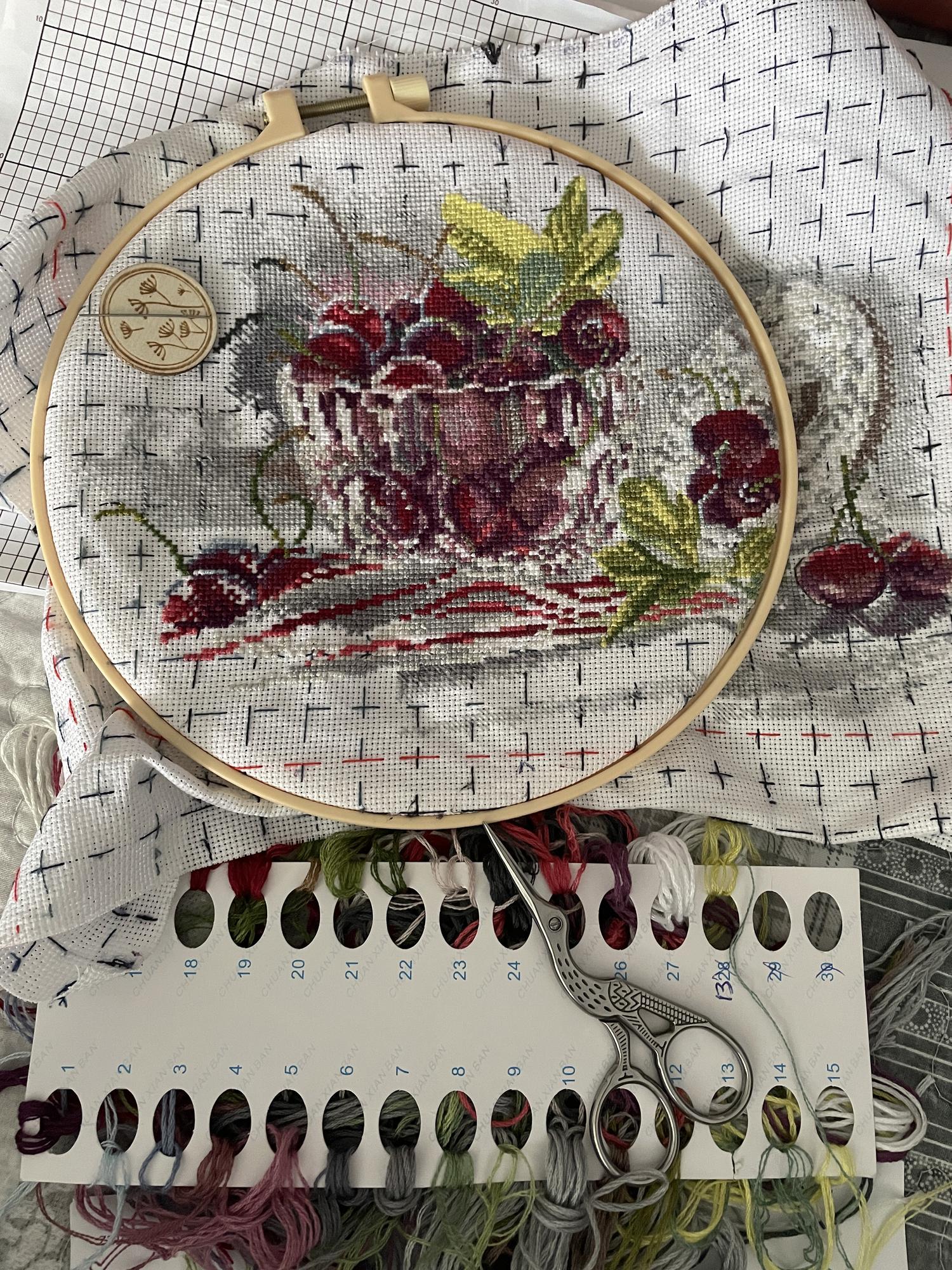 framed embroidered panel with botanical motif
